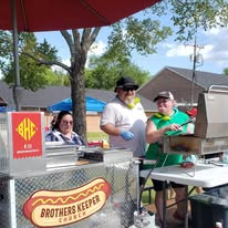 Brothers Keeper Church volunteers serving at the food station