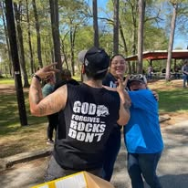 A volunteer celebrating the message that God provides