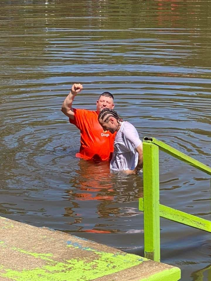 A baptism during homeless outreach ministry
