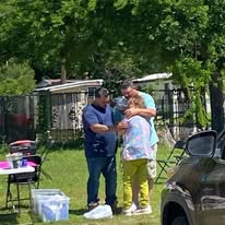 A volunteer praying personally with a neighbor
