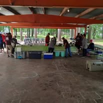 Volunteers operating the outreach serving station