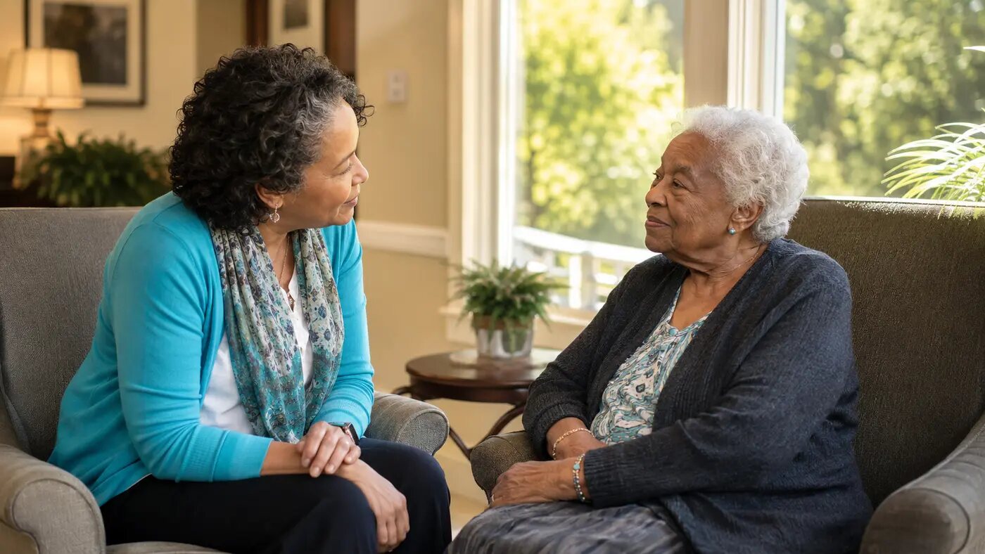 A caring visitor spending time with a nursing-home resident